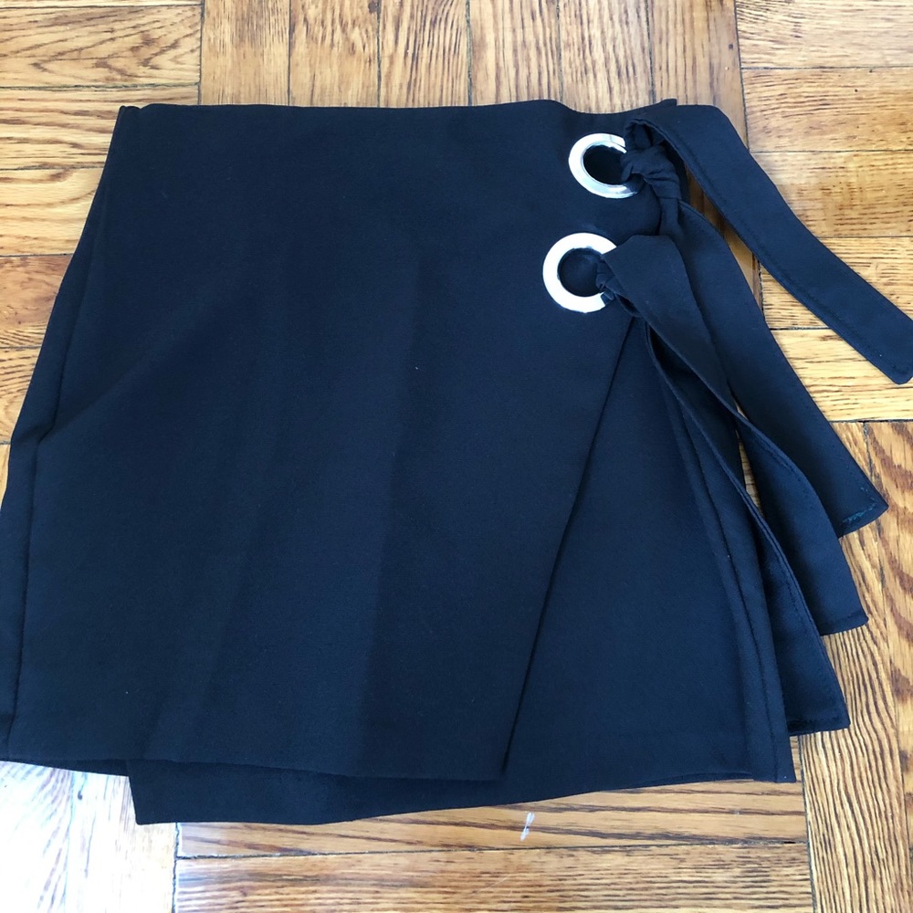 Black wrap mini skirt with silver hardware